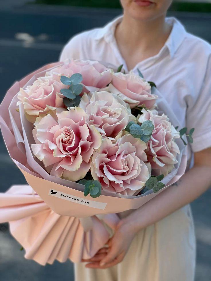 Professional floral arrangement in modern corporate setting